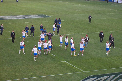 Italy national rugby union players celebrate after their win over France in Rome, 12 March 2011