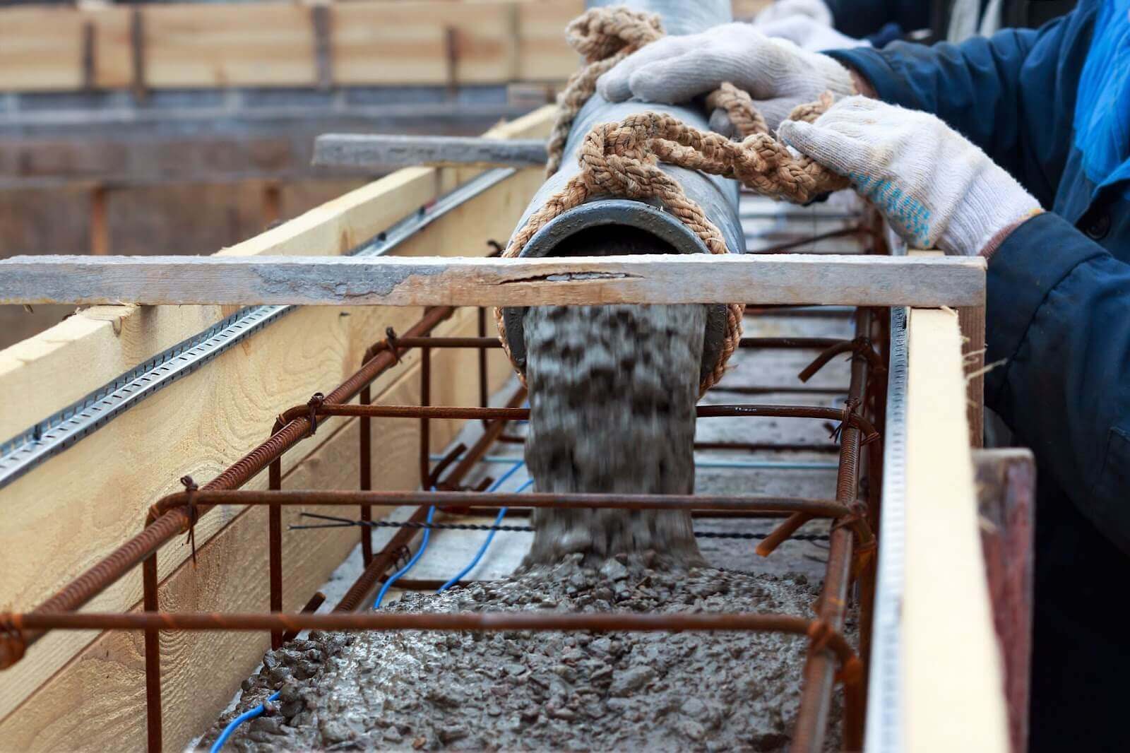 Concrete being poured into a form