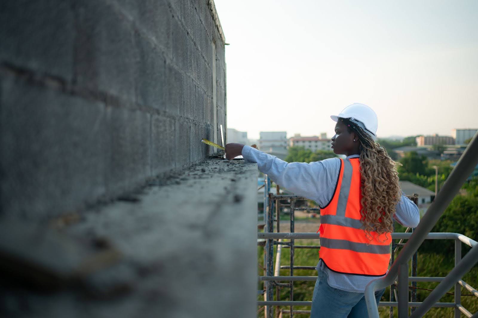 professional performing concrete strength testing