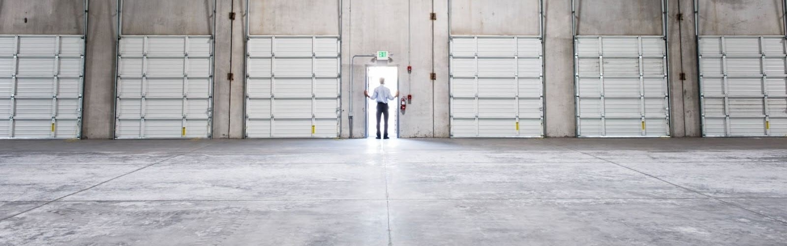 Concrete Warehouse Construction professional examining work