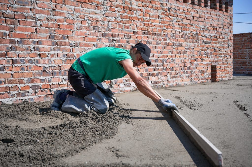 Male worker working on concrete flatwork