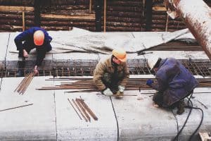 professionals working on concrete