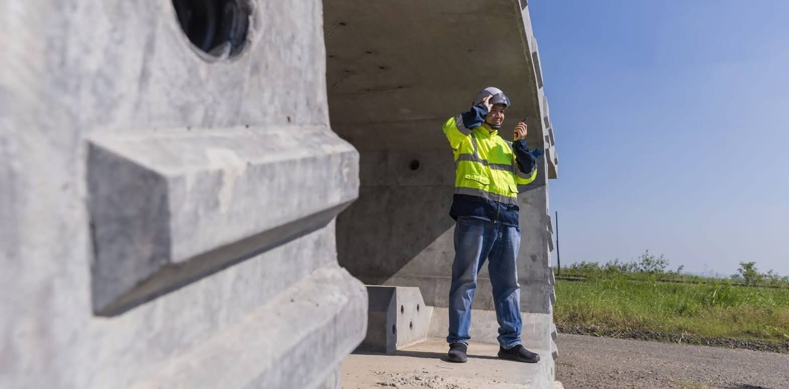 professional reviewing precast concrete on site