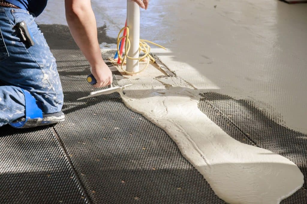 professional working with slab on foundation near utilities infrastructure
