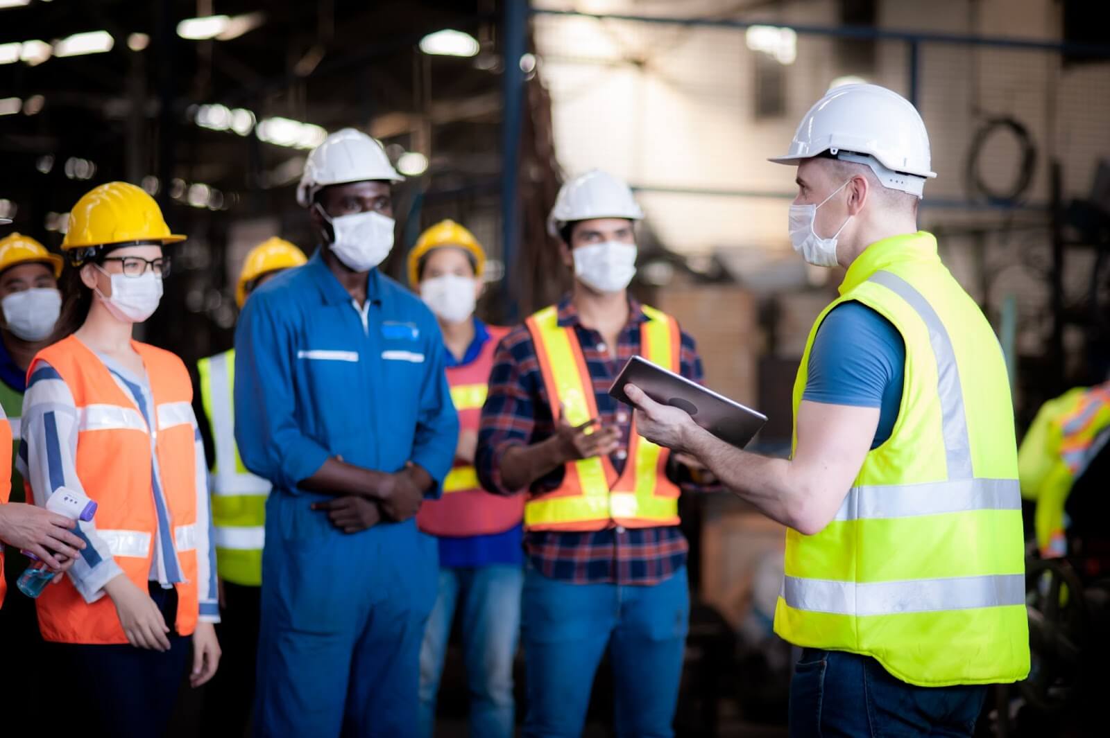 Professionals having a jobsite safety meeting